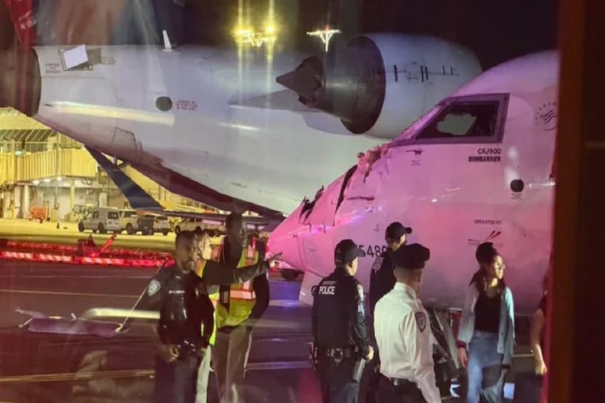 2-pesawat-pesawat-delta-penuh-penumpang-tabrakan-di-bandara-laguardia-new-york-jnb.jpg